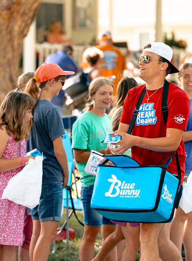 Man handing out Blue Bunny treats