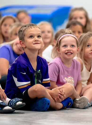 Kids listening to a presentation