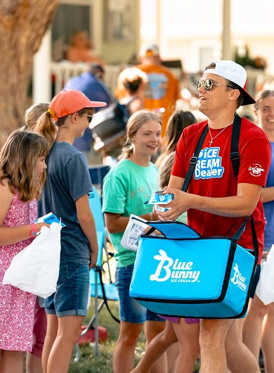 Man handing out Blue Bunny treats