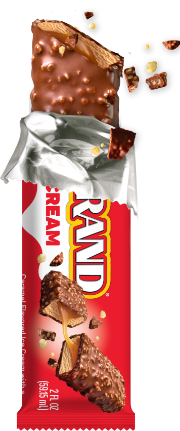 Ice Cream Bar partially unwrapped with a bite taken out and pieces flying