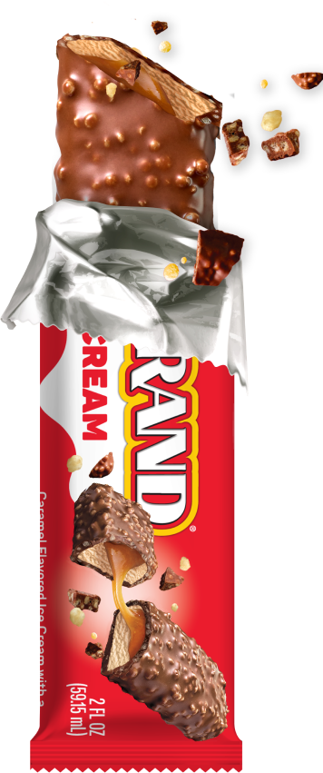 Ice Cream Bar partially unwrapped with a bite taken out and pieces flying